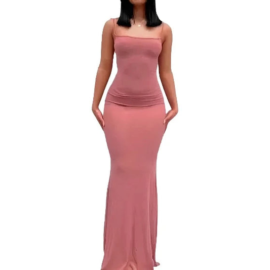 Soft and stretchy blush sleeveless maxi dress with a fitted silhouette.